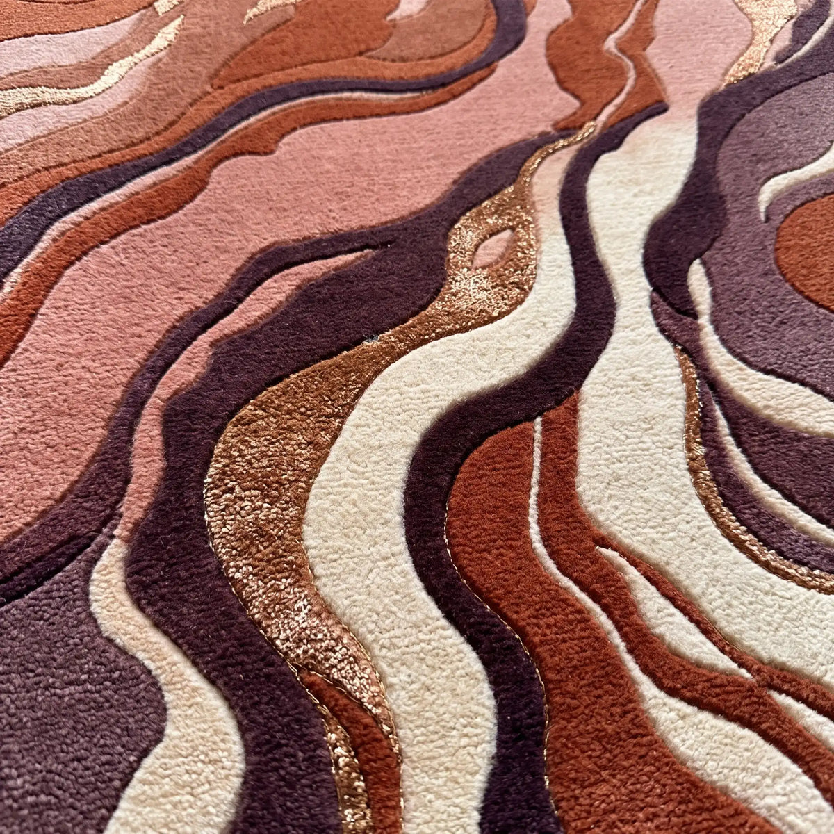 Marble Flow hand-tufted rug in Coral Rose – close-up of the tufted pile texture