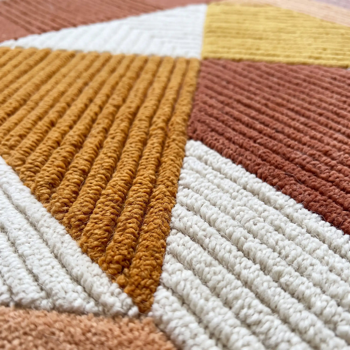 Meridian modern abstract rug in Desert Sun – close-up of the tufted pile texture