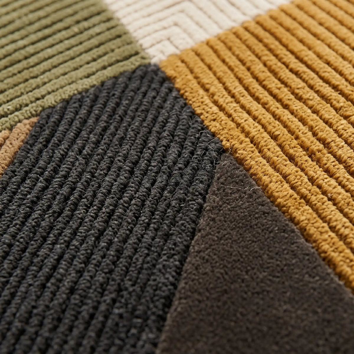 Meridian modern abstract rug in Forest Ochre – close-up of the tufted pile texture