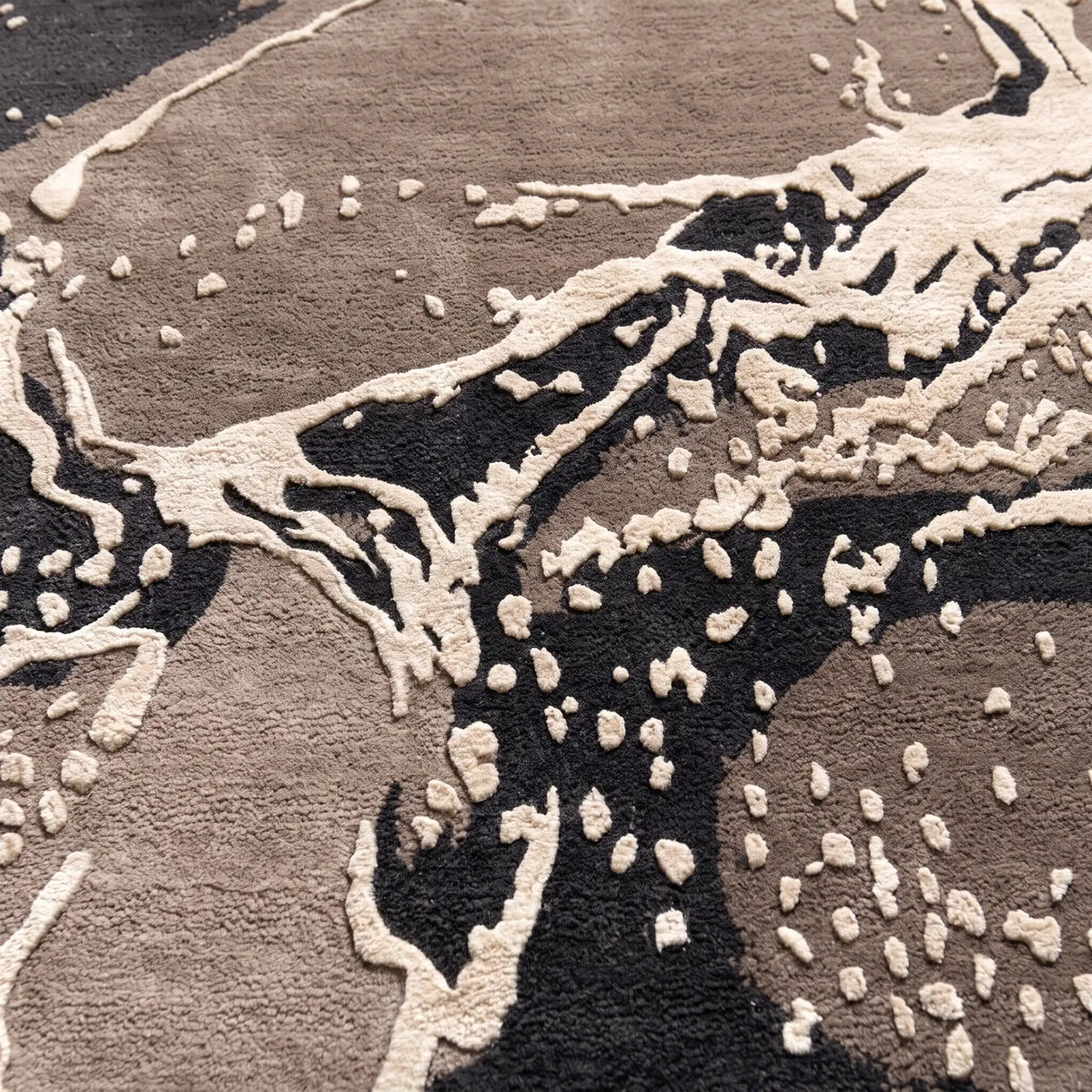 Stone Atlas hand-tufted rug in Smoke Grey – close-up of the tufted pile texture