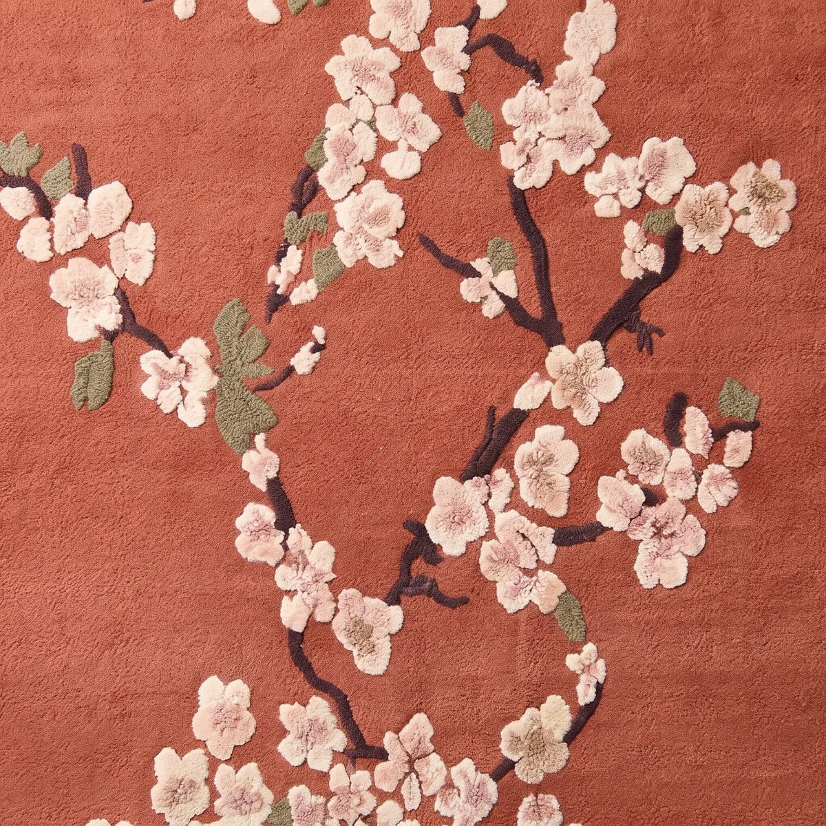 Sakura Branch hand-tufted rug in Terracotta – close-up of the tufted pile texture