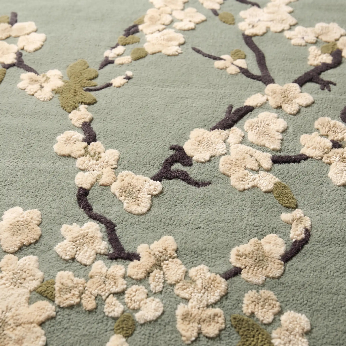 Sakura Branch hand-tufted rug in Sage – close-up of the tufted pile texture