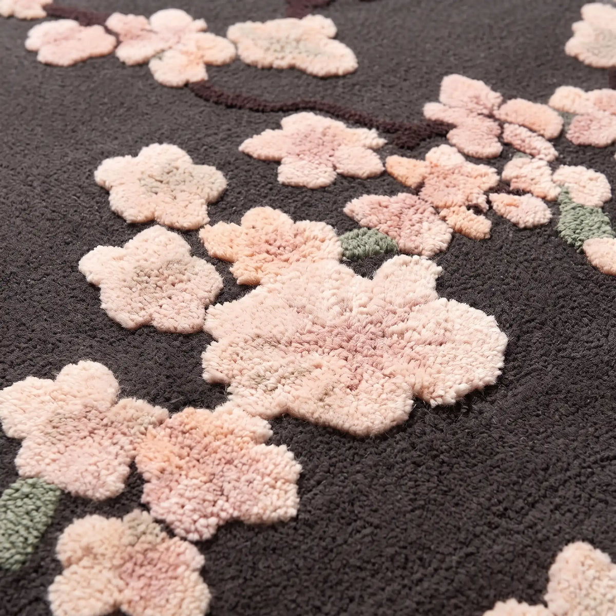 Sakura Branch hand-tufted rug in Mocha – close-up of the tufted pile texture