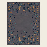 Gilded Terrazzo hand-tufted rug in Charcoal Gold – flat lay