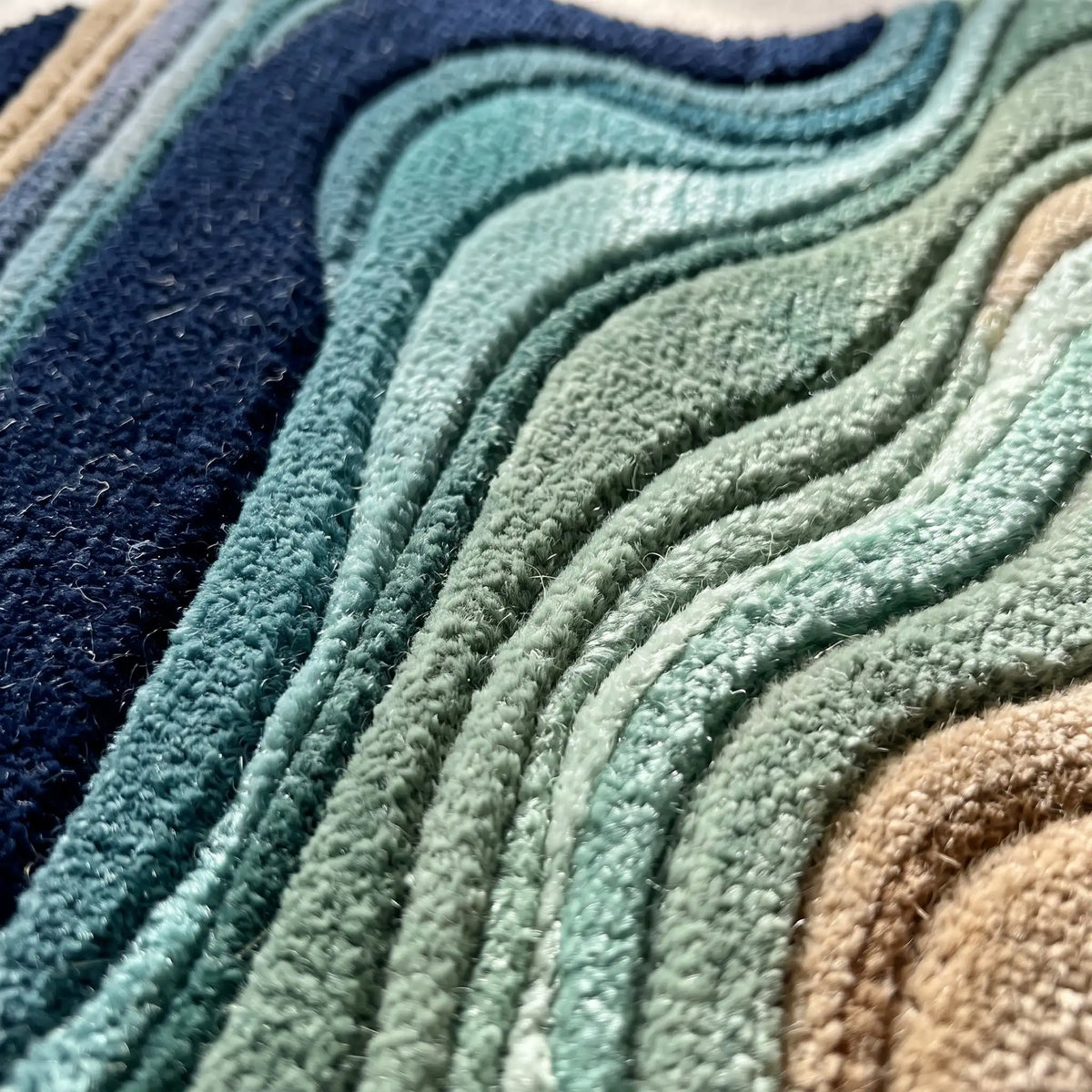 Flowing Strata modern abstract rug in Ocean Teal – close-up of the tufted pile texture