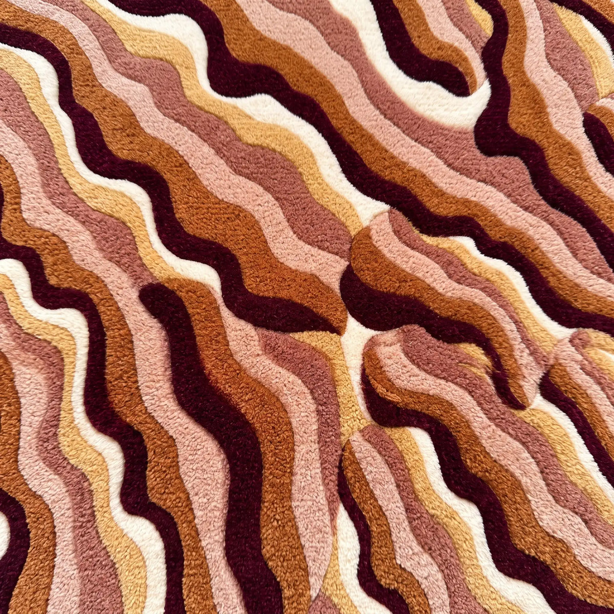 Ripple Dune hand-tufted rug in Rust Ember – close-up of the tufted pile texture