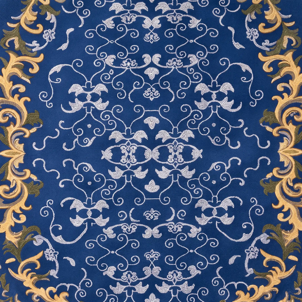 Versailles hand-tufted rug in Royal Navy – close-up of the tufted pile texture