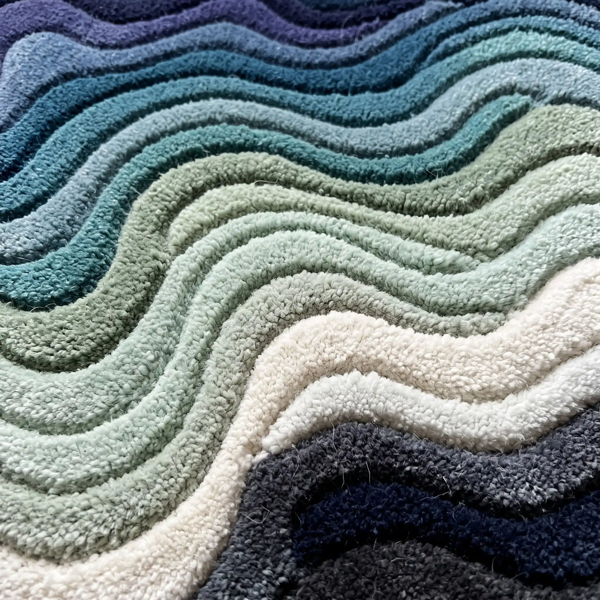Canyon Waves modern abstract rug in Ocean Mist – close-up of the tufted pile texture
